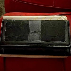 Coach trifold wallet.